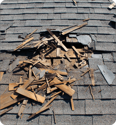 Severe storm damage on a residential shingle roof